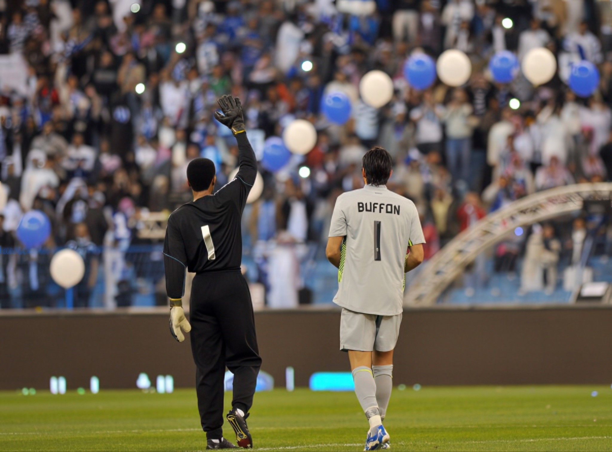 Buffon meets Mohammed Al-Deayea at the latter’s retirement match. Credit: Fayez Nureldine/AFP via Getty Images. 