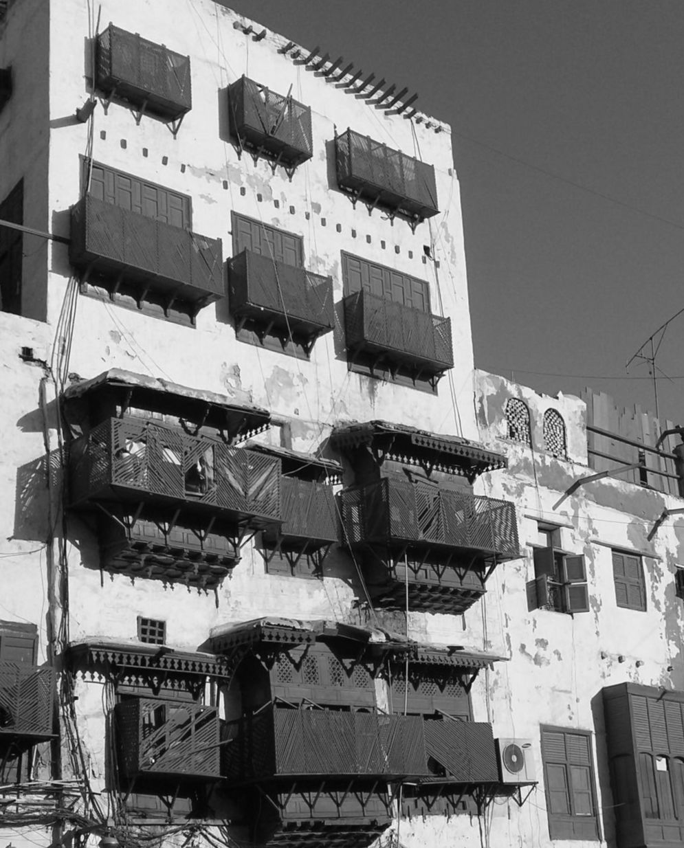 Old Jeddah, Undated, showing Mashrabiyat along windows.Courtesy of Aramco Archives