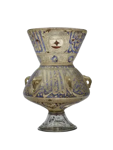 Mosque Lamp. Commissioned by: Amir Sayf al-Din Sarghitmish al-Nasiri, Ras Nowhat-el-Nowab (d. 1358). Egypt or Syria. 1351 - 1358, Mamluk Sultanate (1250-1517). Enamelled glass. 38.7 x 27.5 x 27.5 cm. Louvre Abu Dhabi © Department of Culture and Tourism – Abu Dhabi. Photo by Noora Alzaabi. LAD 2024.021&nbsp;