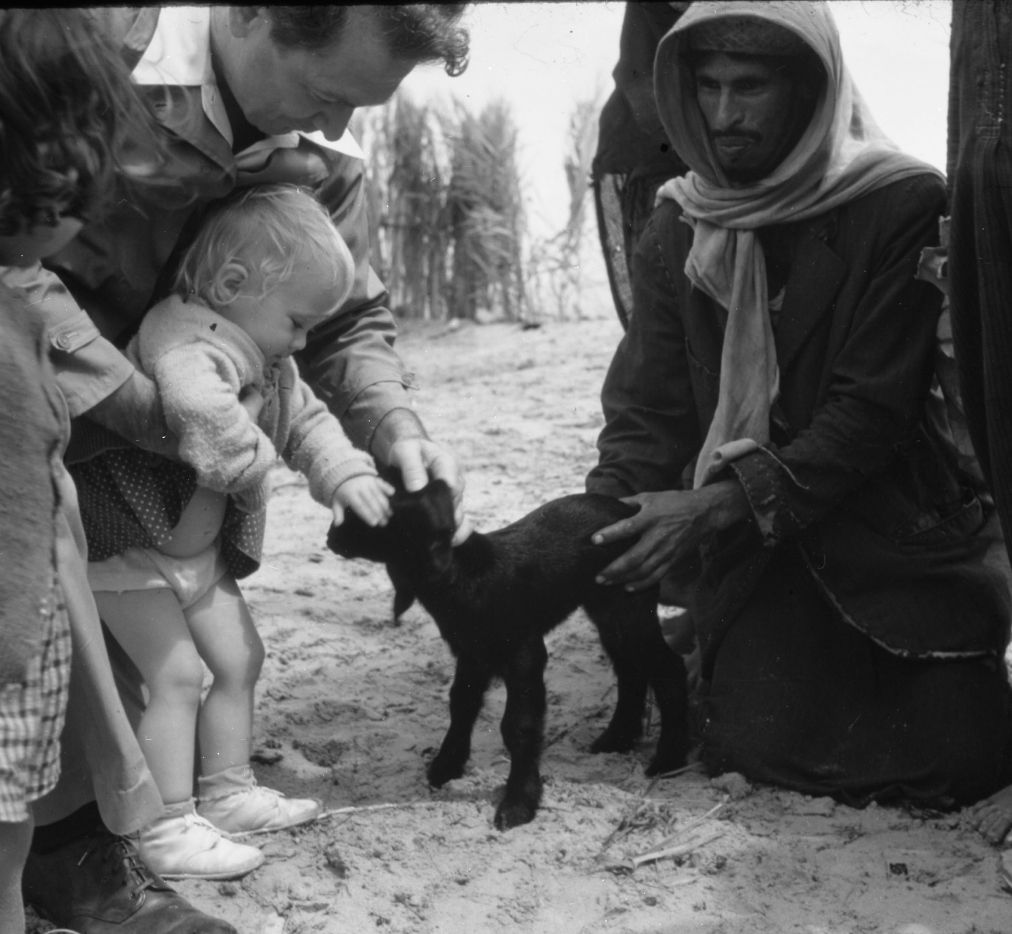 1950s Eastern Province. A loving moment between two babies.
