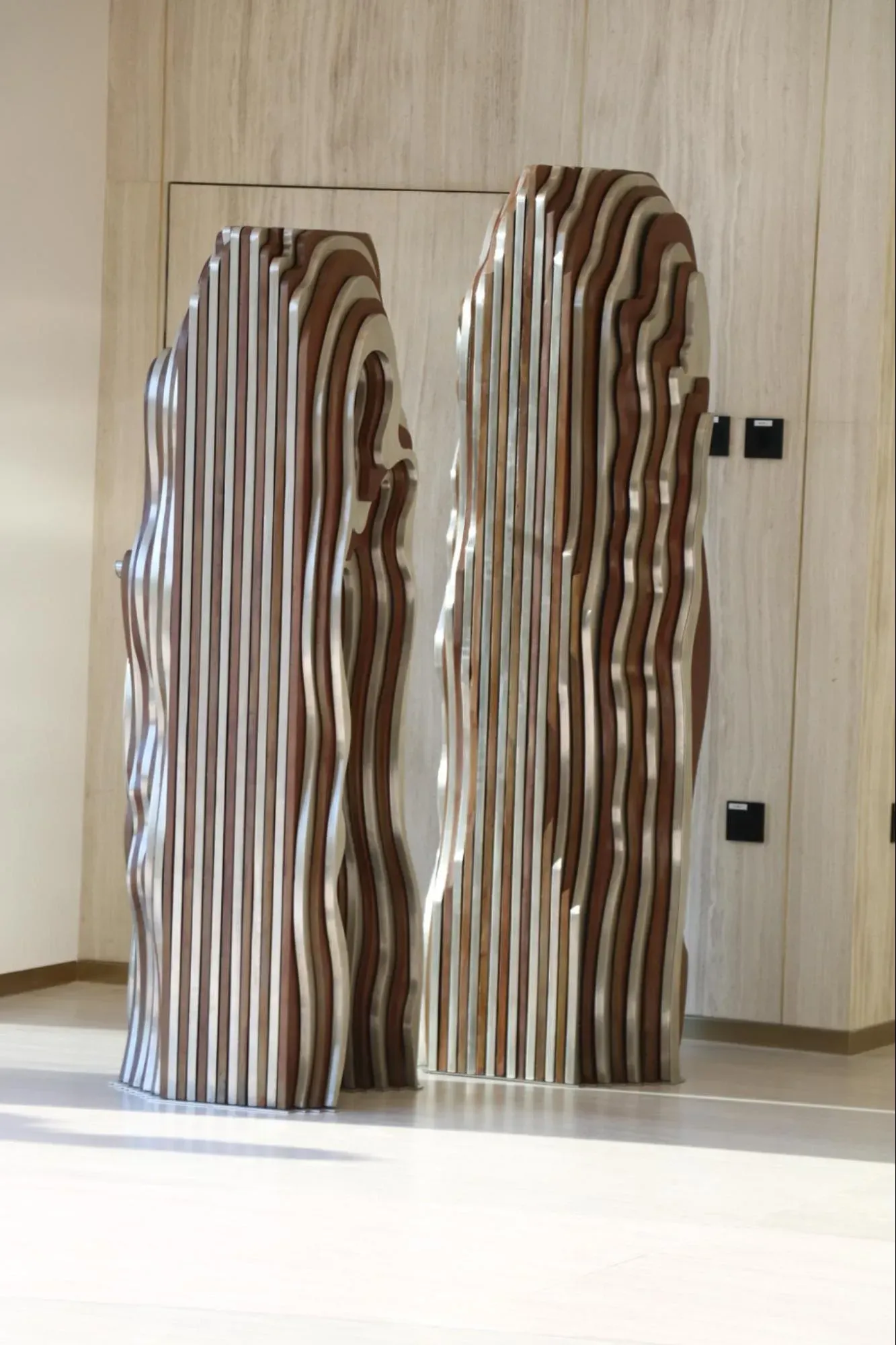 &nbsp;‘Metaphor.’ Azza Alqubaisi. 2024. Stainless steel and mild steel. 50 x 50 x 185 cm and 50 x 50 x 170 cm. Courtesy of Leila Heller Gallery and Azza Alqubaisi.&nbsp;&nbsp;