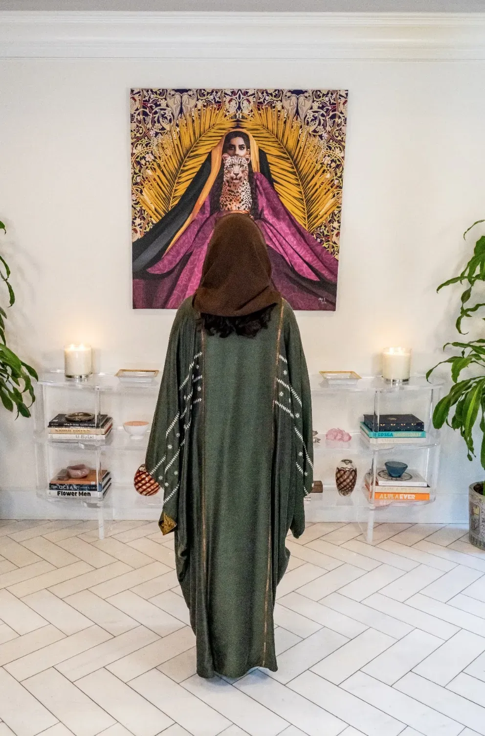 HRH Ambassador Reema Bandar Al-Saud at her home in the United States, in front of one of her beloved art pieces by dynamic Saudi artist Skna Hassan. Photo by Rania Abdel Razek.&nbsp;