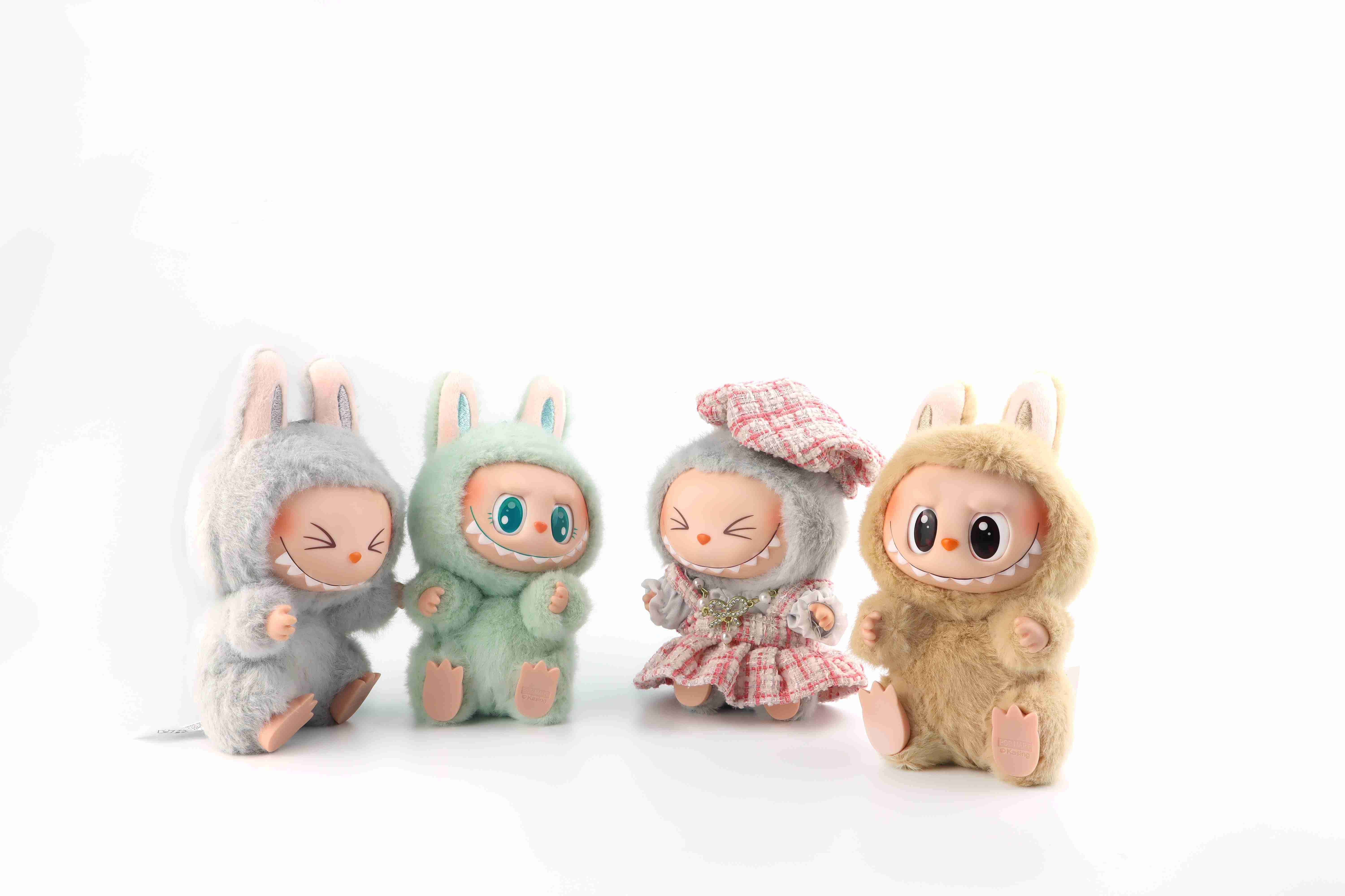 Labubu and its many styles. Bangkok, Thailand, 25 December 2024, art toys Labubu key chain collection from Pop Mart blind box collectible cute toys display on white shelf background at Pop mart flagship store during new release. Credit: Shutterstock. 