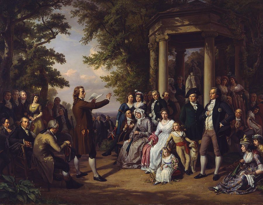 Gemälde von Goethe und Schiller: Der Weimarer Musenhof, oil painting by Theobald von Oer 1860: Schiller reading in Tiefurter Park. Among the audience is also Goethe (standing on the right).